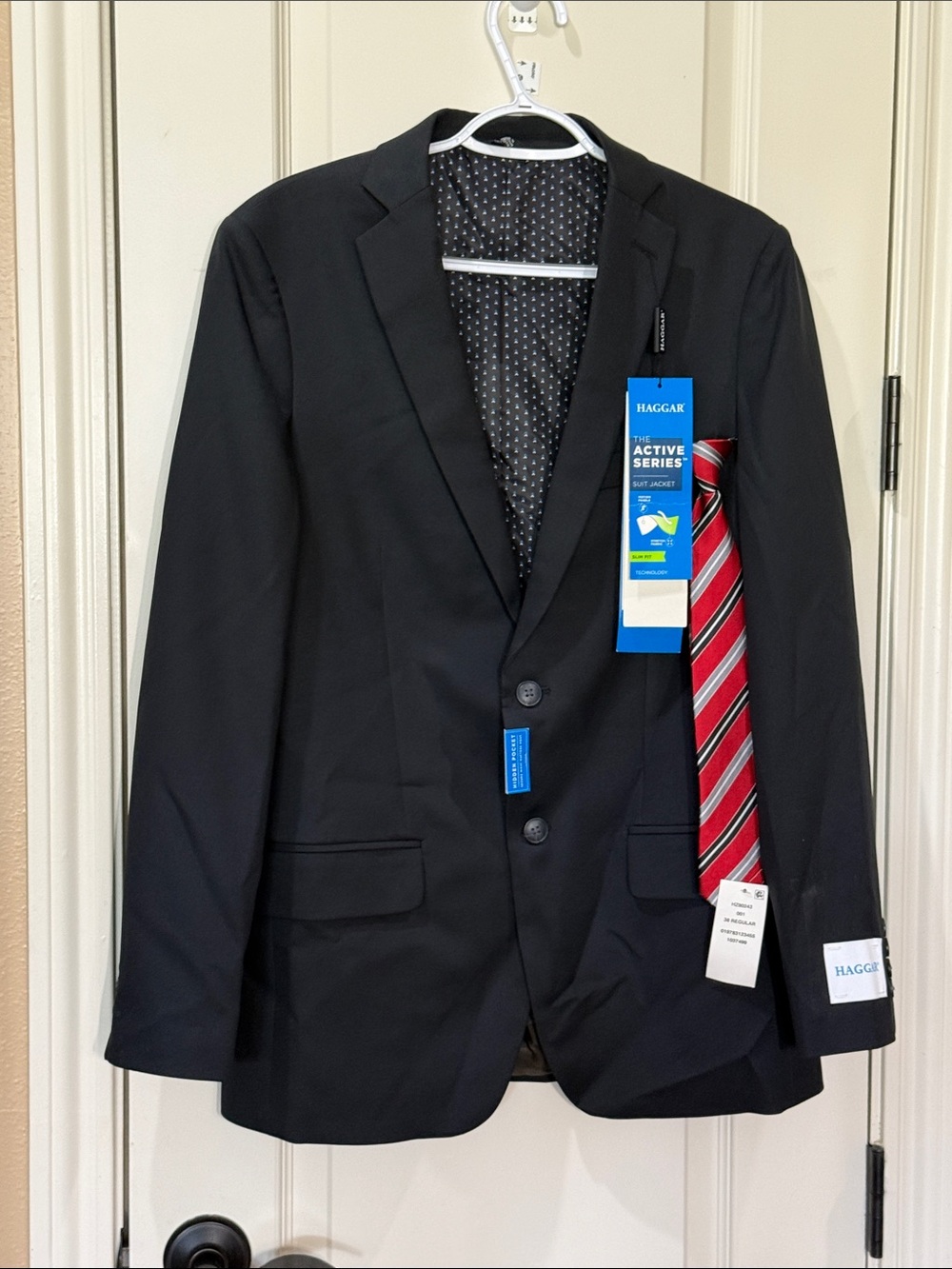 Haggar Black Two-Button Suit Jacket with Red Clip On Striped Tie